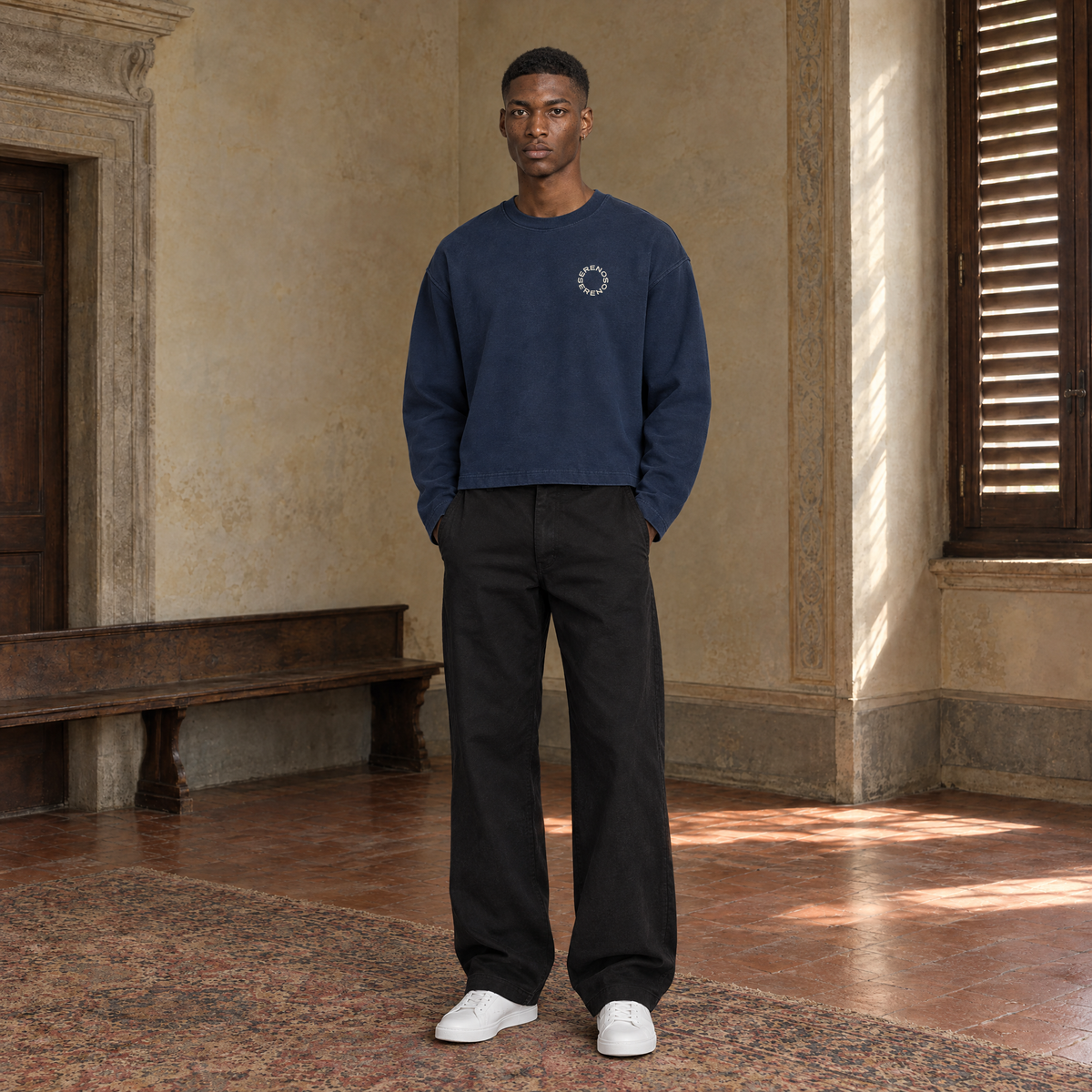Man wearing the SERENOS Shy long sleeve in navy blue, front view with the small ring logo on the chest