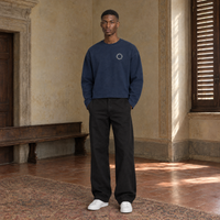 Man wearing the SERENOS Shy long sleeve in navy blue, front view with the small ring logo on the chest