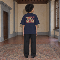 Woman wearing the SERENOS Success T-Shirt in navy blue, back print reading Success is just a series of failures